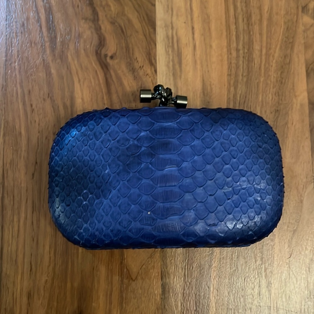 Blue snakeskin leather clutch.